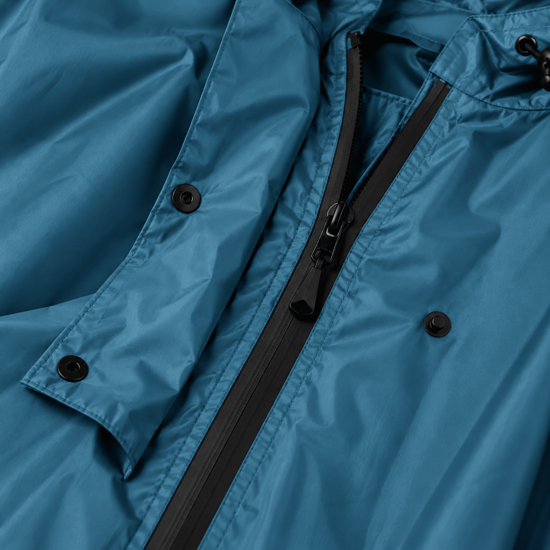 Regenponcho Übergröße mit Kapuze und Taschen Blau - FestivalStuff